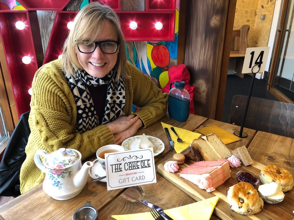 Steph Taylor enjoying her Charity Recharge afternoon tea at Cake 'Ole Bradford